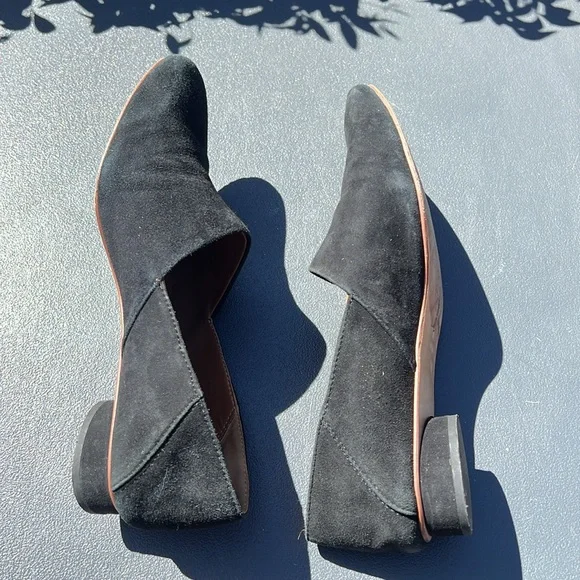 The Row black suede loafer